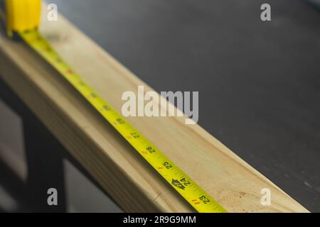 Selective focus measuring tape copy space backgrounds wood material Stock Photo