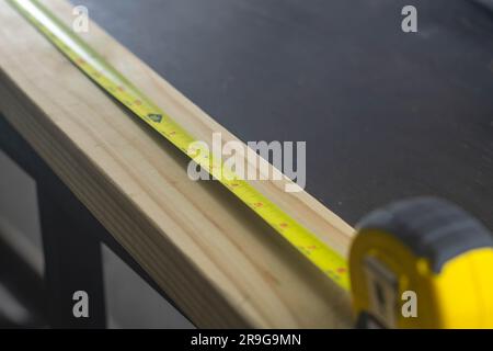 Selective focus measuring tape copy space backgrounds wood material Stock Photo