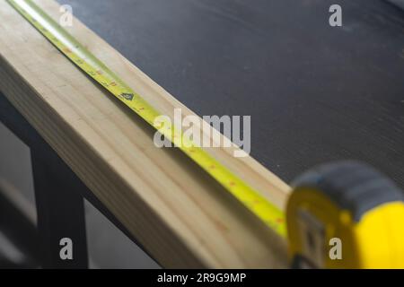 Selective focus measuring tape copy space backgrounds wood material Stock Photo