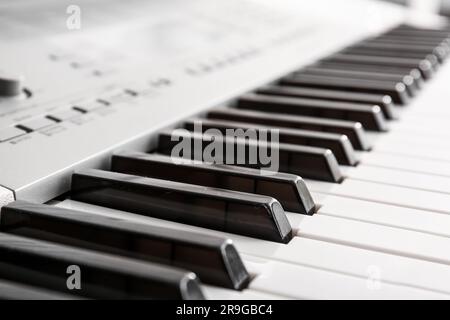 Modern synthesizer in room, closeup Stock Photo