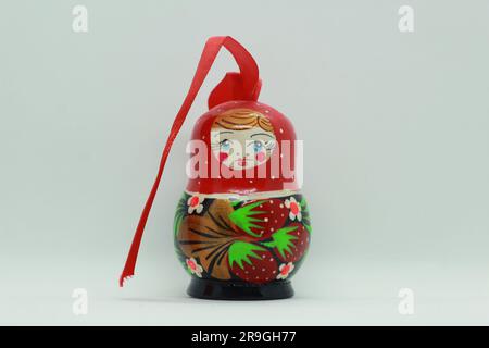 Matryoshka doll with ribbon Stock Photo