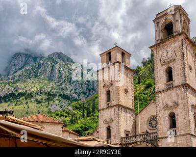 In Old Kotor, Montenegro, a low angle view of the two stone bell towers of the landmark 12th centuryCathedral of Saint Tryphon. Stock Photo