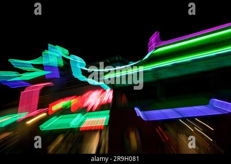 Zoom blur of neon signs at Chinese New Year in Los Angeles Stock Photo