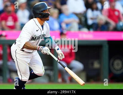 Seattle Mariners' Kolten Wong follows through during a baseball game  against the Washington Nationals, Tuesday, June 27, 2023, in Seattle. (AP  Photo/Lindsey Wasson Stock Photo - Alamy