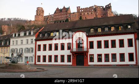 Academy of Science on the Karlsplatz, Heidelberg Castle in the background above, view at sunset, Heidelberg, Germany Stock Photo