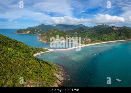 Koh Phangan, Thailand: Dramatic aerial panorama of the Mae Haad beach in the Ko Pha Ngan island in the gulf of Thailand in Southeast Asia. Stock Photo