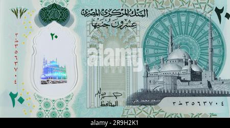 Large fragment of the obverse side of the new Egyptian 20 EGP LE twenty polymer pounds cash money banknote bill features Mohamed Ali Mosque and adorne Stock Photo