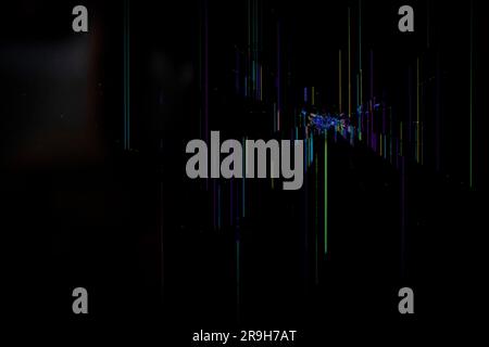 Broken Liquid Crystal Display screen with broken glass digital pattern on a black device screen background Stock Photo
