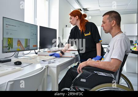 Non Exclusive: LVIV, UKRAINE - JUNE 23, 2023 - Serviceman of the Azov Regiment Oleksandr who partially lost his eyesight goes through the Squeeze the Stock Photo