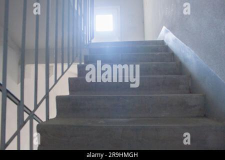 Grey and white staircase in a house Stock Photo