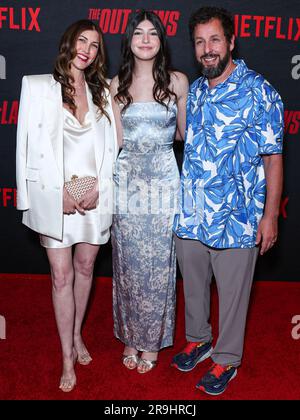 LOS ANGELES, CALIFORNIA, USA - JUNE 26: Jackie Sandler, daughter Sadie Sandler and husband Adam Sandler arrive at the Los Angeles Premiere Of Netflix's 'The Out-Laws' held at Regal LA Live on June 26, 2023 in Los Angeles, California, United States. (Photo by Xavier Collin/Image Press Agency) Stock Photo