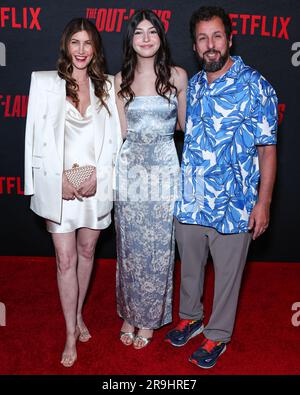 LOS ANGELES, CALIFORNIA, USA - JUNE 26: Jackie Sandler, daughter Sadie Sandler and husband Adam Sandler arrive at the Los Angeles Premiere Of Netflix's 'The Out-Laws' held at Regal LA Live on June 26, 2023 in Los Angeles, California, United States. (Photo by Xavier Collin/Image Press Agency) Stock Photo