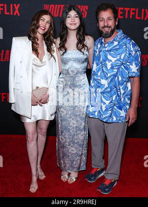 LOS ANGELES, CALIFORNIA, USA - JUNE 26: Jackie Sandler, daughter Sadie Sandler and husband Adam Sandler arrive at the Los Angeles Premiere Of Netflix's 'The Out-Laws' held at Regal LA Live on June 26, 2023 in Los Angeles, California, United States. (Photo by Xavier Collin/Image Press Agency) Stock Photo