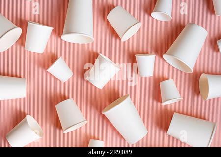 Different sized to go coffee cups. Various paper coffee cups. Stock Photo