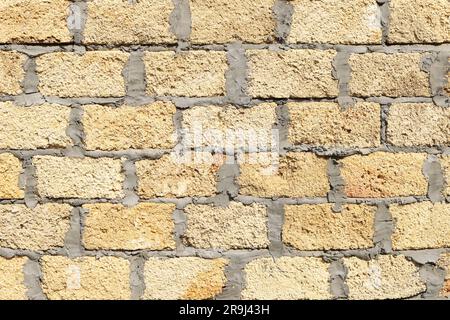 Limestone laid stone bricks with cement background texture. Natural ...