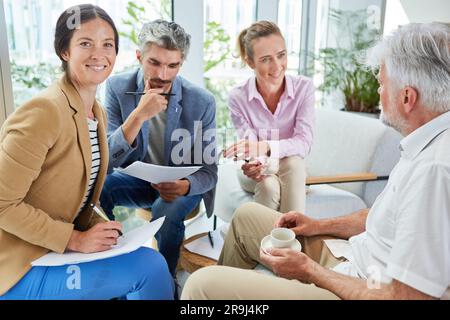 Successful businesspeople having team meeting in the office Stock Photo
