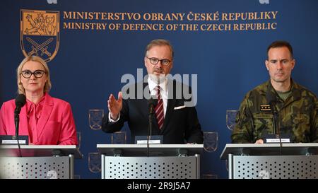 Prague, Czech Republic. 27th June, 2023. Czechia provided 24 tanks, 76 infantry fighting vehicles and 645 anti-tank guided missiles to Ukraine from January to May, PM Petr Fiala (centre) told media at the Defence Ministry in Prague, Czech Republic, June 27, 2023. Minister Jana Cernochova (left) said there is still equipment in the army's stocks that can be sent to Kyiv, Ukraine. Czech Chief of the General Staff Karel Rehka (right) has been regularly evaluating the possibilities, Cernochova (Civic Democrats, ODS) said. Credit: Michal Kamaryt/CTK Photo/Alamy Live News Stock Photo