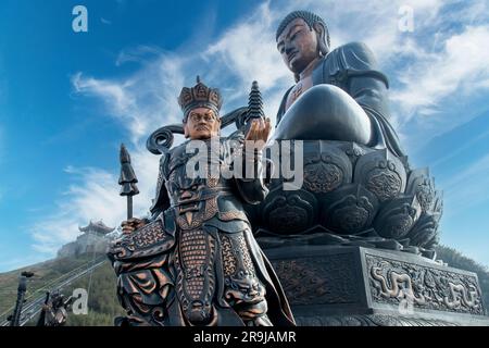 Sa Pa, Vietnam-April 2023; Low angle close up of the Bronze Great Amitabha Buddha statue at the summit of Fanxipan Mountain or roof of Indochina Stock Photo
