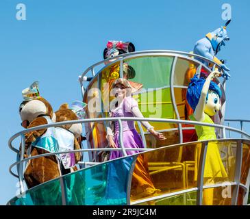 Paris, France - June 02, 2023: Show performed in the morning in the central square on the occasion of the thirtieth anniversary. Characters and princesses on the parade float. Stock Photo