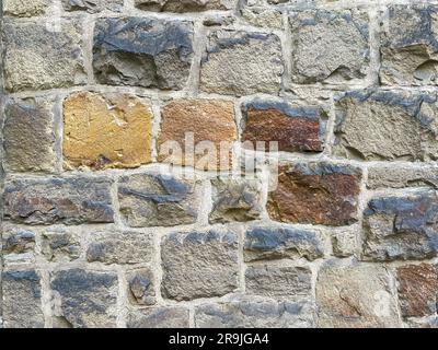 Close Up Stone Wall Texture with big bricks on ancient historic church in Germany, Europe Stock Photo