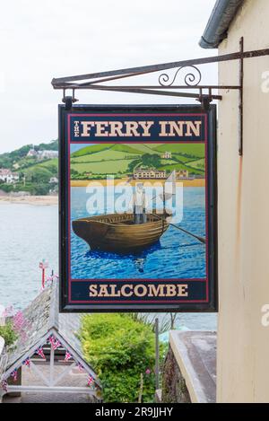 Colourful painted sign for the Ferry Inn pub in the coastal town of Salcombe, Devon Stock Photo