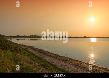 Sunset over Danish Baltic Sea island Kegnæs, view from Als across Hørup Hav Stock Photo