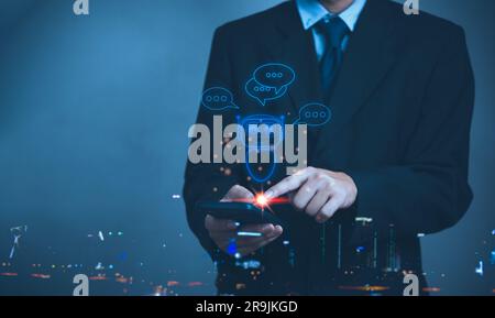 Businessman holding a light chatbot hologram intelligence AI. Digital chatbot, robot application. chat with AI Artifice intelligent developers digital Stock Photo