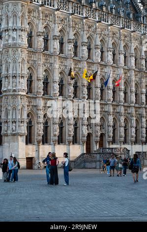 Leuven, Flemish Brabant, Belgium, July 23, 2023 - Students walking in front of the city hall Stock Photo