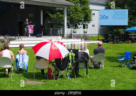 Teens Against Genital Mutilation rally, Hyannis, MA, USA (Cape Cod). Crowd listens to main speaker Stock Photo