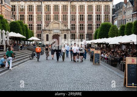 Leuven, Flemish Brabant, Belgium, July 23, 2023 - Crowd of students at the Old Market square with terraces and bars Stock Photo