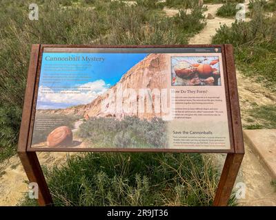 Dickinson, ND USA - May 17, 2023: The informational sign at the Cannonballs area of the badlands hills and mountains in Theodore Roosevelt National Pa Stock Photo