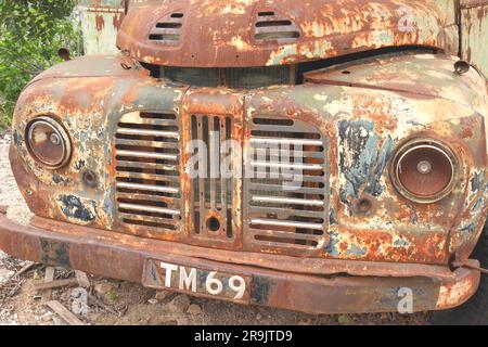 Radiator of rusty old 1970s school bus, Episkopi, near Paphos, Republic of Cyprus Stock Photo