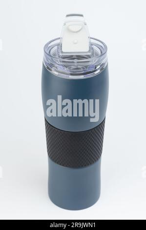Open blue thermos flask stand on white studio background Stock Photo