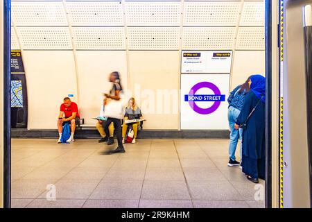 Looking out through the train doors form an Elizabeth Line London Underground train at the platform at Bond Street Station Stock Photo