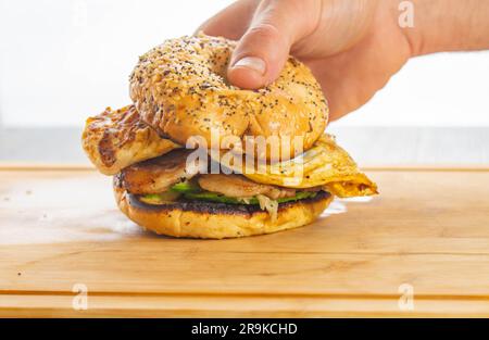 Breakfast sandwich pork bacon avocado and egg isolated studio shot copy space backgrounds breakfast nutrition, carbs diets lifestyle, fast food Stock Photo