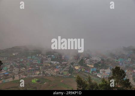 Beautiful rural village Poombarai View Over The Misty Clouds. Poombarai is a scenic village in the Palani hills of Kodaikanal, Tamil Nadu. Stock Photo