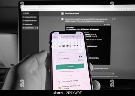 Azores, Portugal - 21.01.2023: User holding SmartPhone, while doing email login to ChatGPT service. Developed by OpenAI. Stock Photo