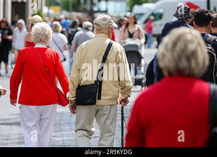 Leipzig, Germany. 27th June, 2023. Senior citizens go shopping through downtown Leipzig. The approximately 21 million pensioners in the country will receive more money starting in July. With the annual pension adjustment, old-age pensions will rise by 4.39 percent in the west and 5.86 percent in the east. In addition, almost 30 years after reunification, the so-called pension value in the east will be brought into line with that in the west - one year earlier than planned. Credit: Jan Woitas/dpa/Alamy Live News Stock Photo