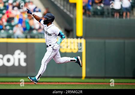 Seattle Mariners third baseman Eugenio Suarez throws to first base against  the Detroit Tigers in a baseball game, Saturday, July 15, 2023, in Seattle.  (AP Photo/Lindsey Wasson Stock Photo - Alamy