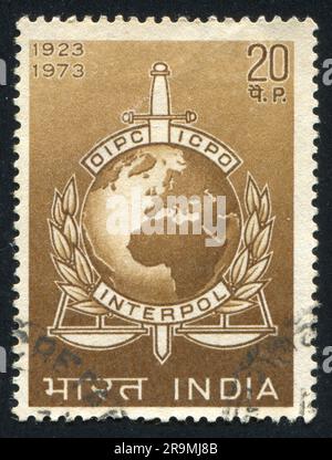 INDIA - CIRCA 1973: stamp printed by India, shows INTERPOL Emblem, circa 1973 Stock Photo