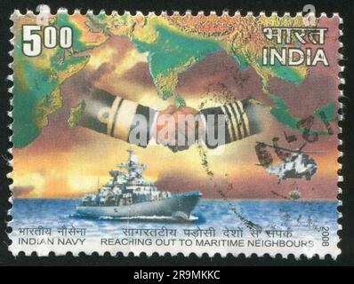 INDIA - CIRCA 2008: stamp printed by India, shows ship, hands, map, water, helicopter, circa 2008 Stock Photo