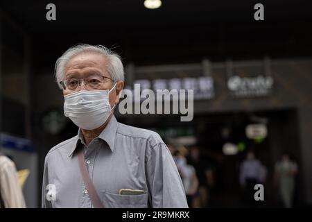 Tokyo, Japan. 27th June, 2023. Senior citizen exits Yurakucho station in central Tokyo. Credit: SOPA Images Limited/Alamy Live News Stock Photo