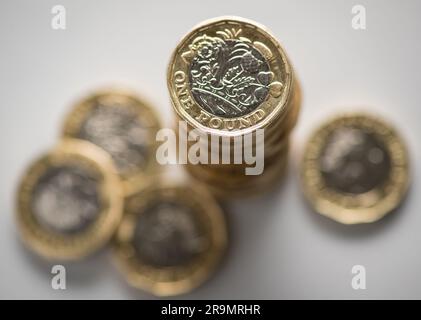 File photo dated 26/01/2018 of British one pound coins. Concerns have been raised about struggling borrowers potentially being preyed on by loan sharks. One in 14 (7%) of people surveyed in June said they or someone else in their household has borrowed from an unlicensed or unauthorised informal money lender who charges interest in the past three years. The survey was carried out by Ipsos UK, among more than 1,800 people aged 18 to 75 years old across Britain. Issue date: Wednesday June 28, 2023. Stock Photo