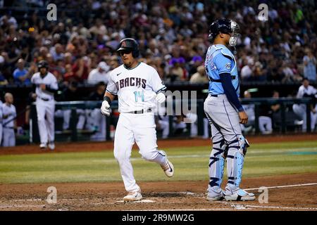 Arizona Diamondbacks' Nick Ahmed fields the ball against the St. Louis  Cardinals during the first inning of a baseball game, Tuesday, July 25,  2023, in Phoenix. (AP Photo/Matt York Stock Photo - Alamy