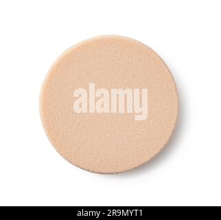 Beige makeup sponge placed on a white background. Viewed from above. Stock Photo