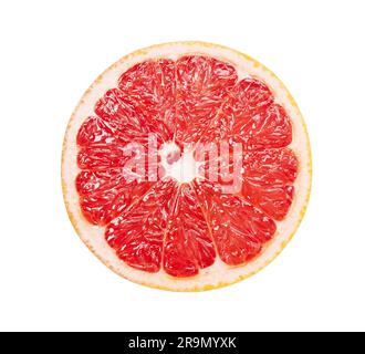 A grapefruit cut in half placed on a white background. Stock Photo
