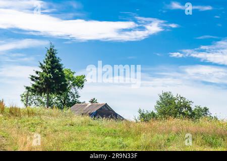 Beautiful old abandoned building farm house in countryside on natural background, photography consisting of old abandoned building farm house at wild Stock Photo