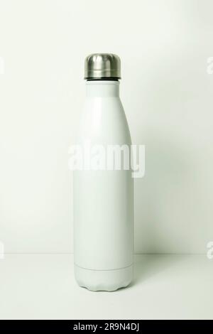 White metal water bottle on white background with copy space for text. Stock Photo