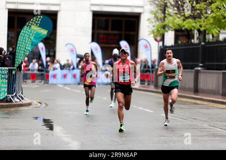 Yuki Kawauchi,  (JPN), passing through Cabot Square on his way to finishing 1st, in his category in a time of 02:13:18, in the 2023 London Marathon Stock Photo