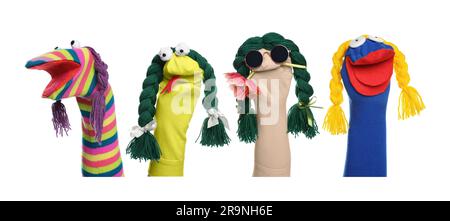 Many colorful sock puppets with braids on white background, collage design Stock Photo